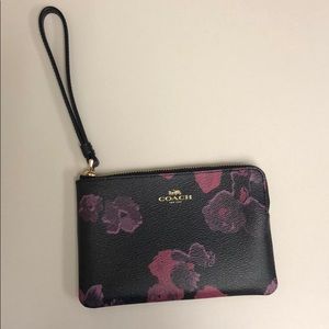 Coach wristlet (black) with purple/ magenta flower